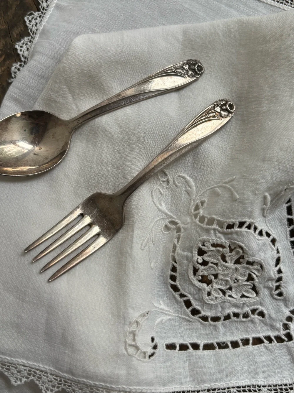 Vintage silver plated baby spoon and fork with embossed daffodil. Rogers Bros